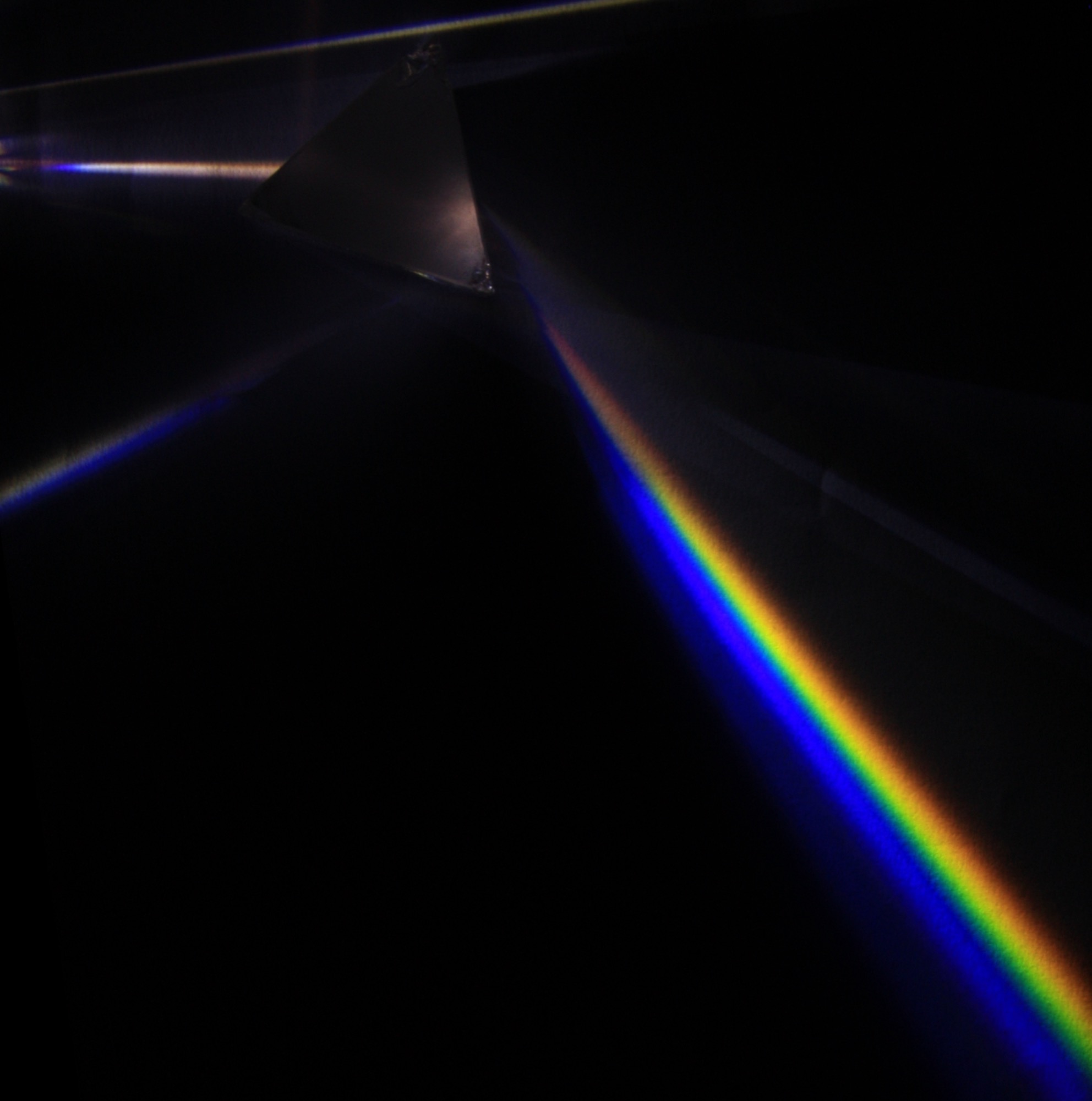 A prism splitting white light into a spectrum