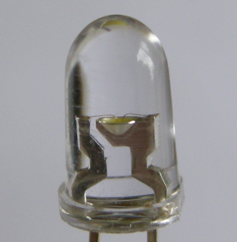 A white LED close up, a yellow phosphor over the blue chip