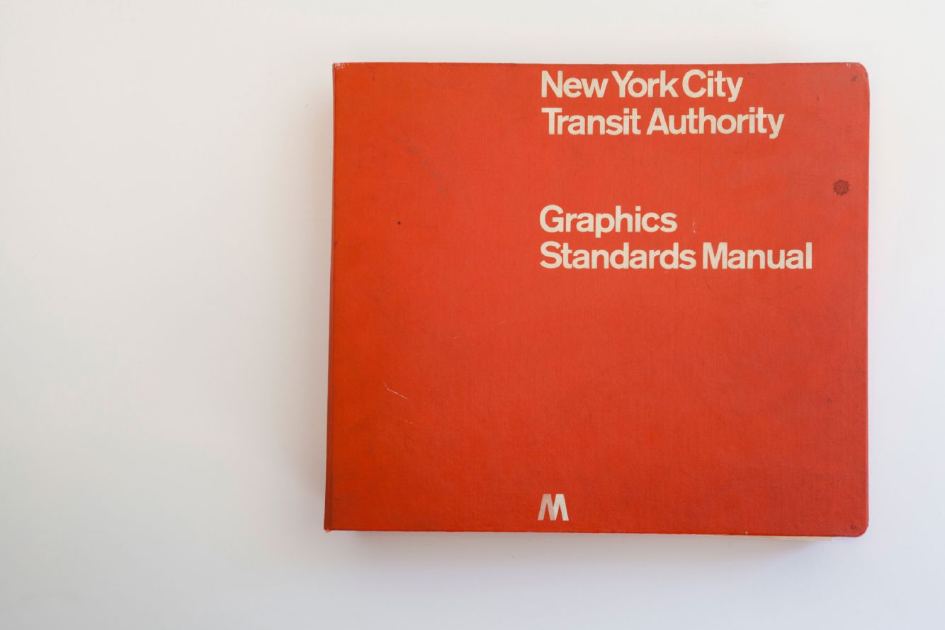 Red binder cover of the New York City Transit Authority Graphics Standards Manual